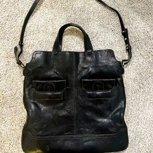 Jamin Puech timeless black leather bag with strap, handles and inside pocket.